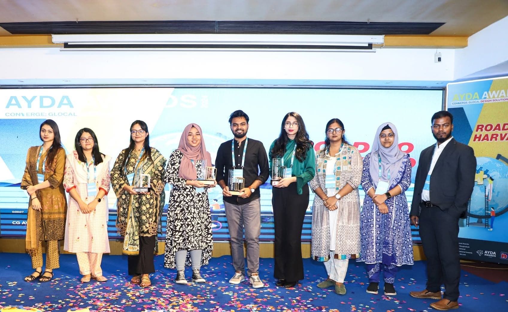 Department of Architecture students celebrating with trophies at the AYDA Awards ceremony